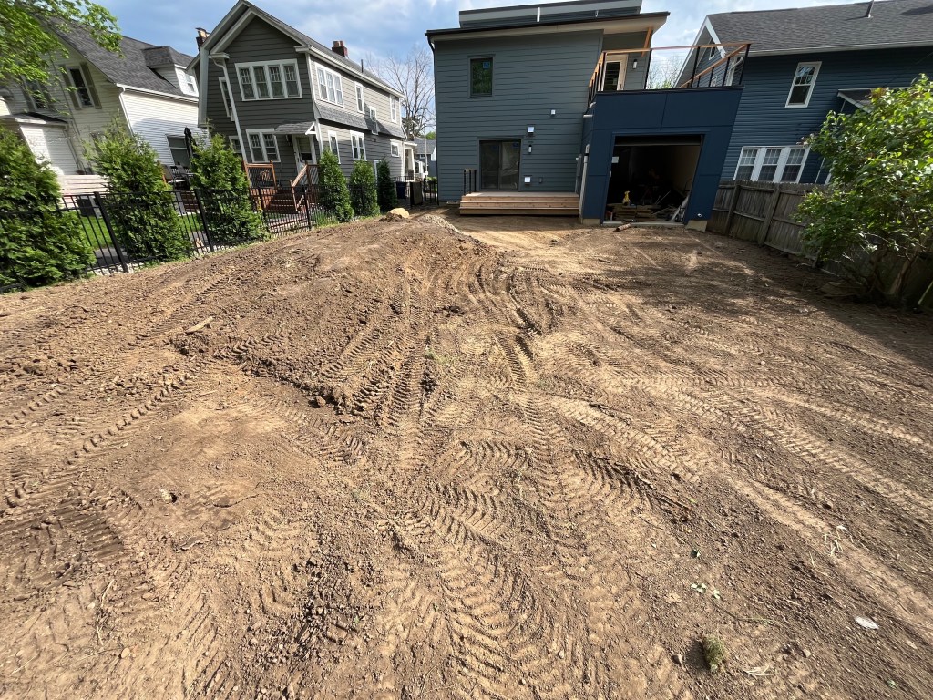 Getting some soil moved around the house during finish grading