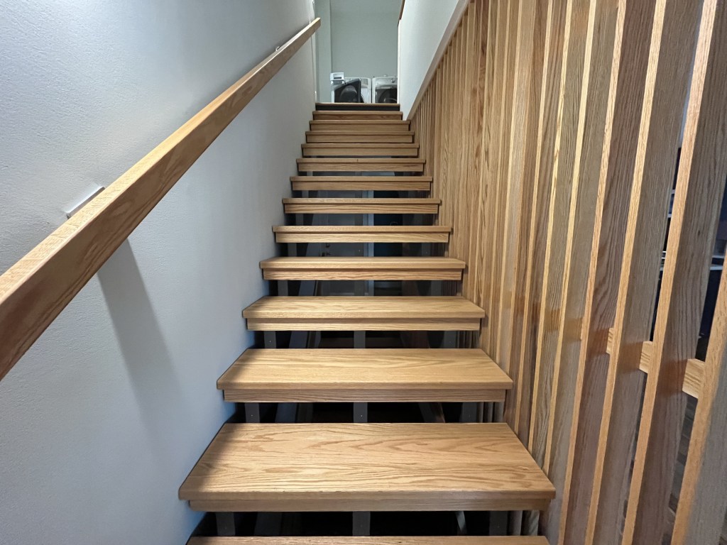 Open-riser stairs to the second floor