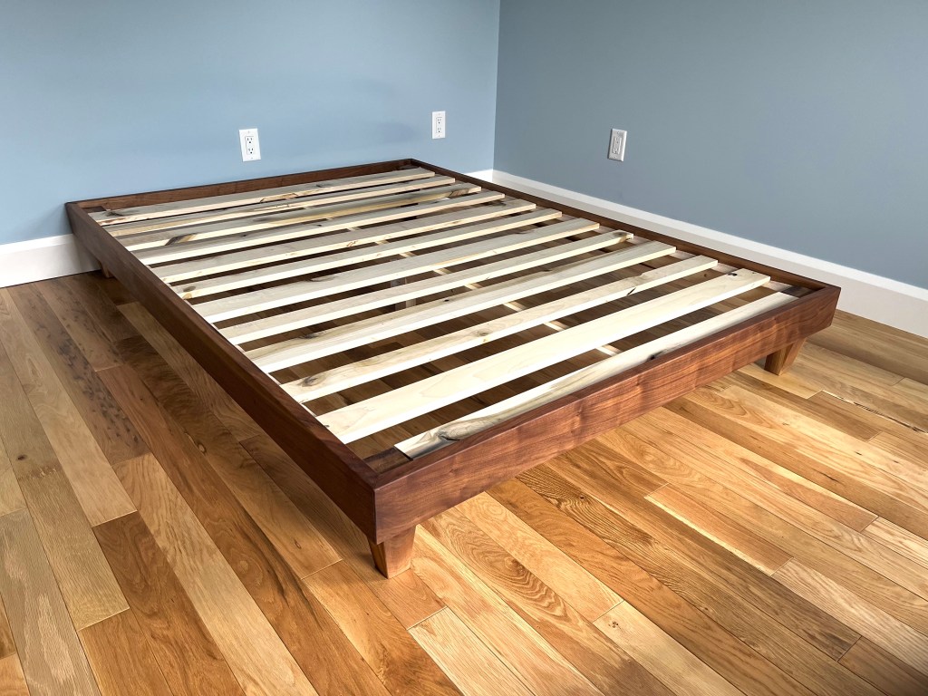 Walnut and poplar bed frame made from on-site lumber